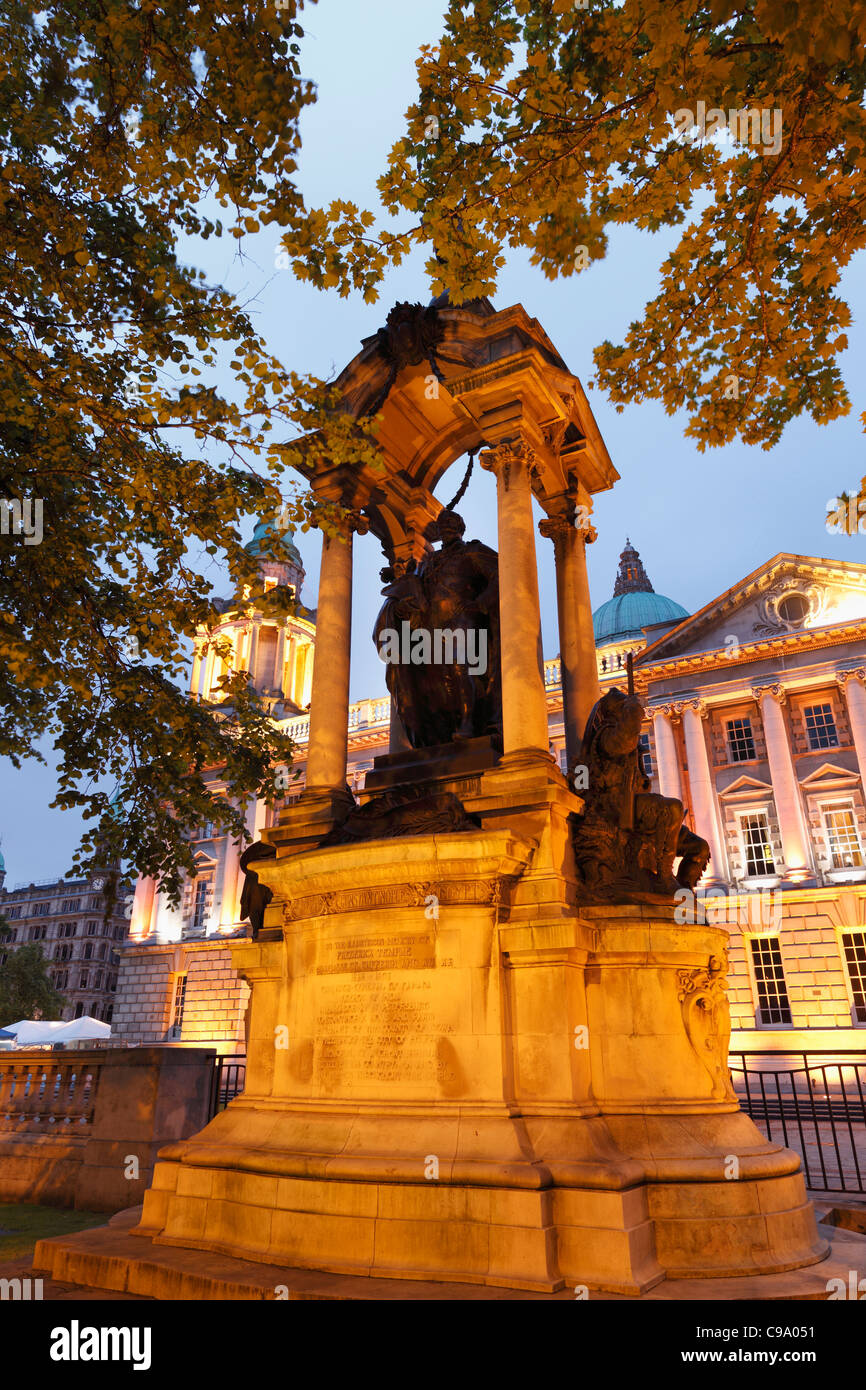 United Kingdom, Ireland, Northern Ireland, Belfast, Frederick Temple Marquess of Dufferin memorial with city hall in background Stock Photo