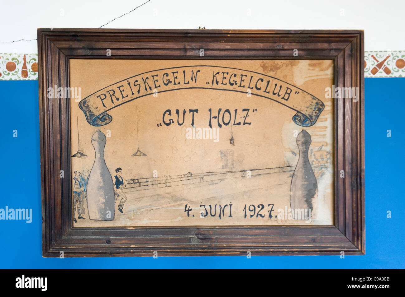 Sign 'Gut Holz' from 1927 in the bowling alley in the former mining town of Kolmanskop in Namibia Stock Photo