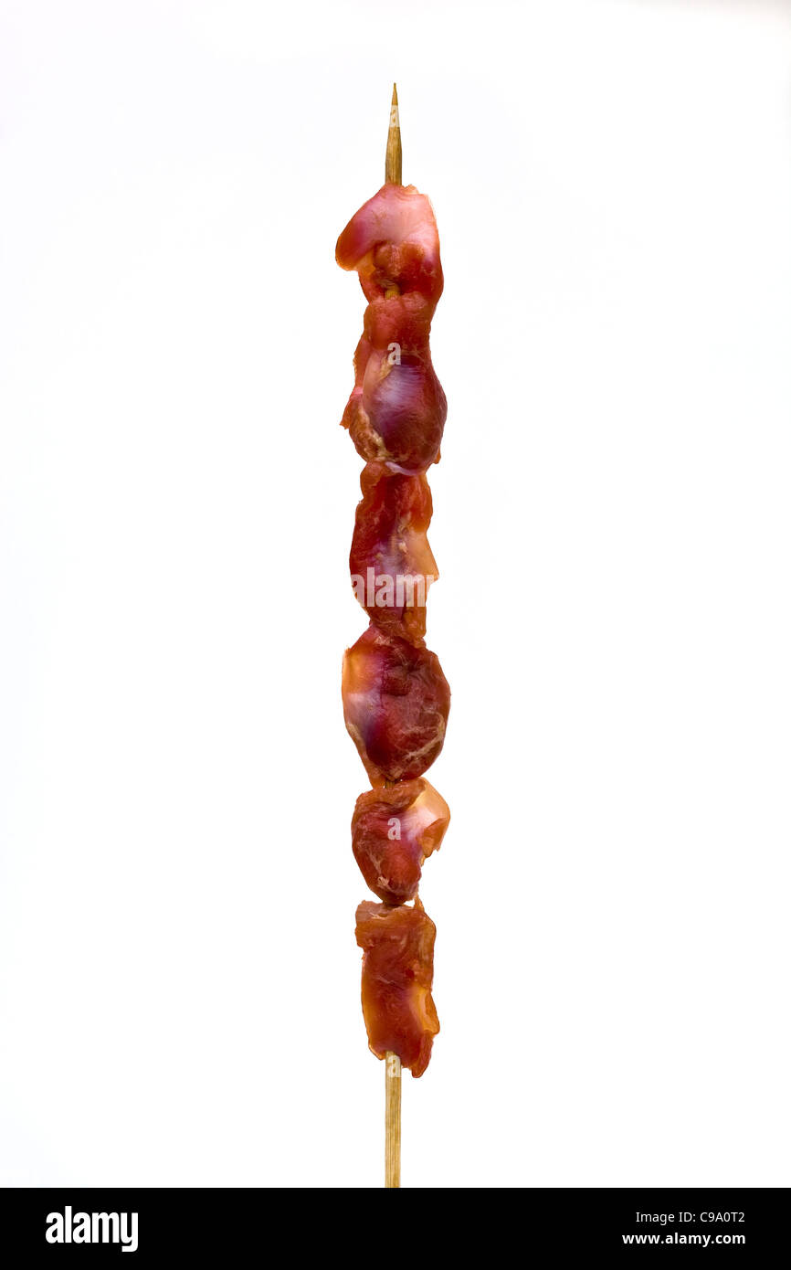 Raw Chicken Gizzard on a stick ready for cooking at at Donghuamen night