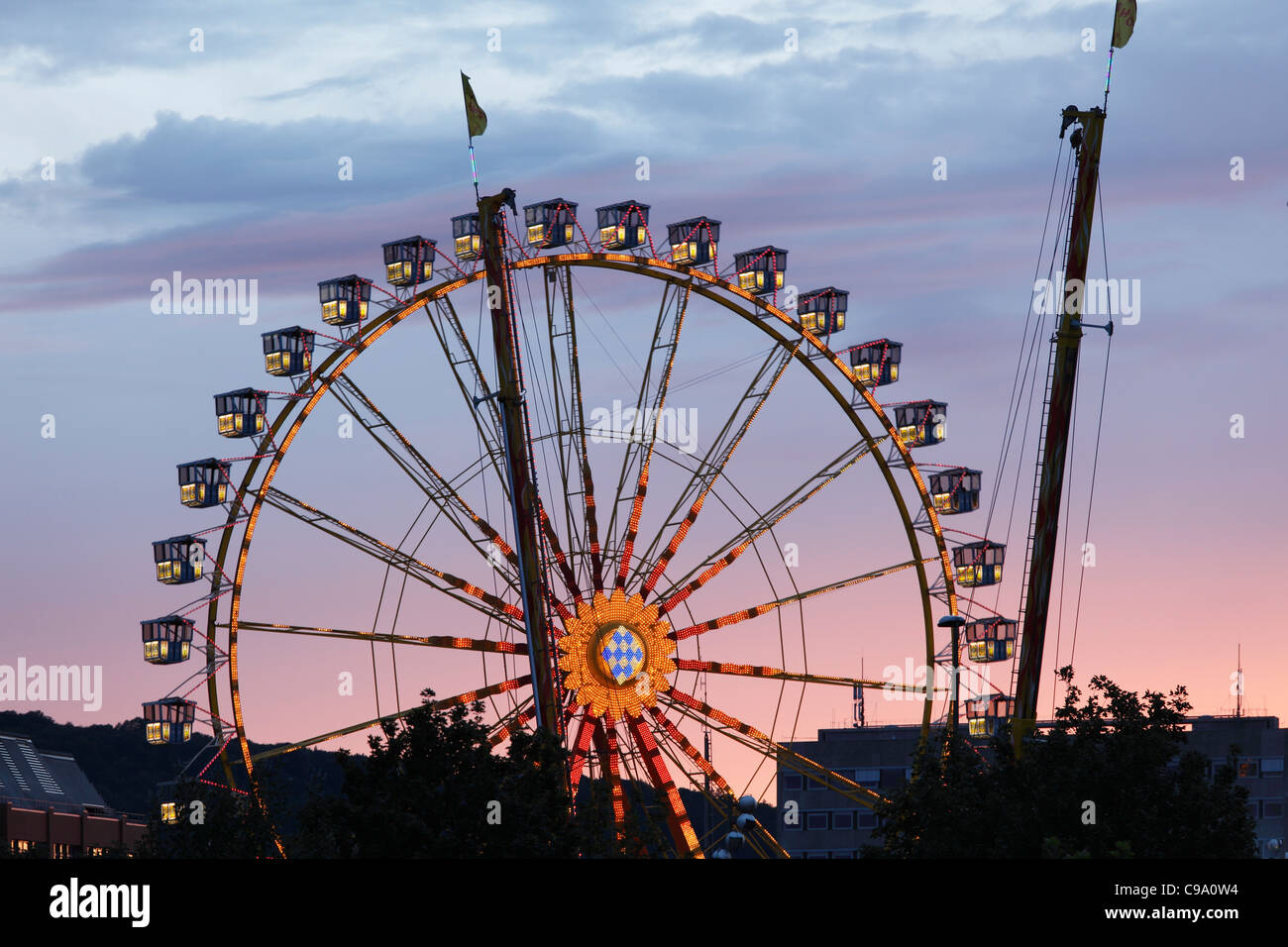 Germany, Bavaria, Wuerzburg, View of Big wheel in kiliani fair Stock Photo