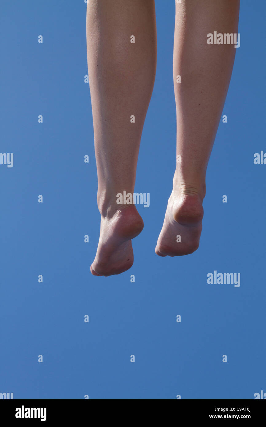 woman legs hanging dangling Stock Photo Alamy