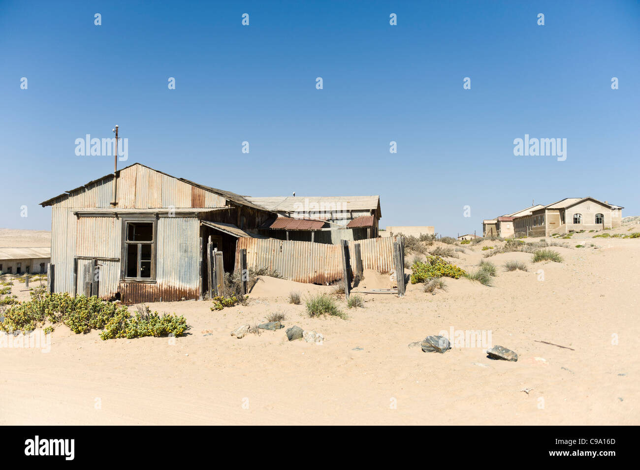 Abandoned factory in Kolmanskop the former mining town in Namibia Stock Photo