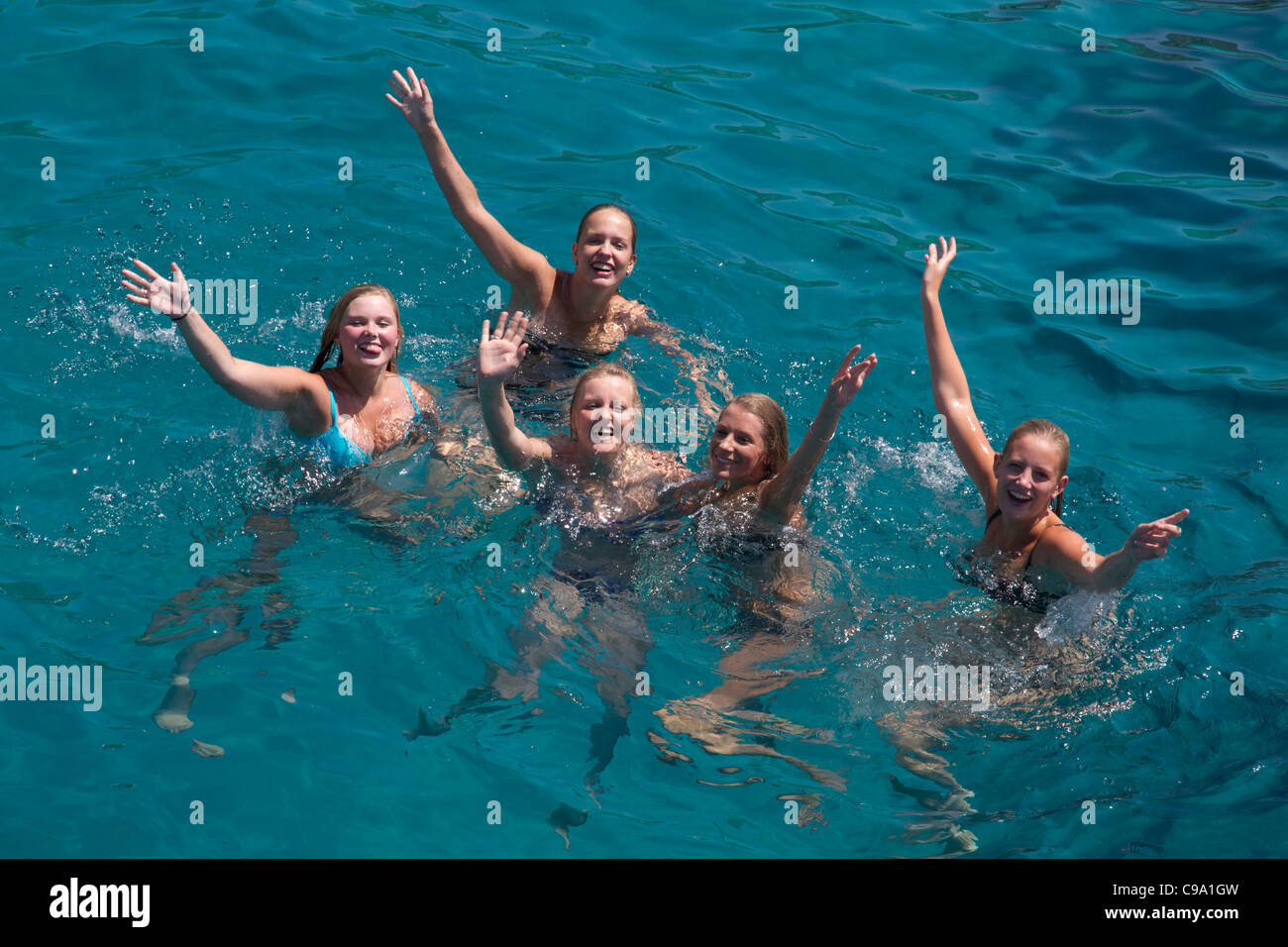 Group Young women bathing fun into clean sea water Mallorca Majorca