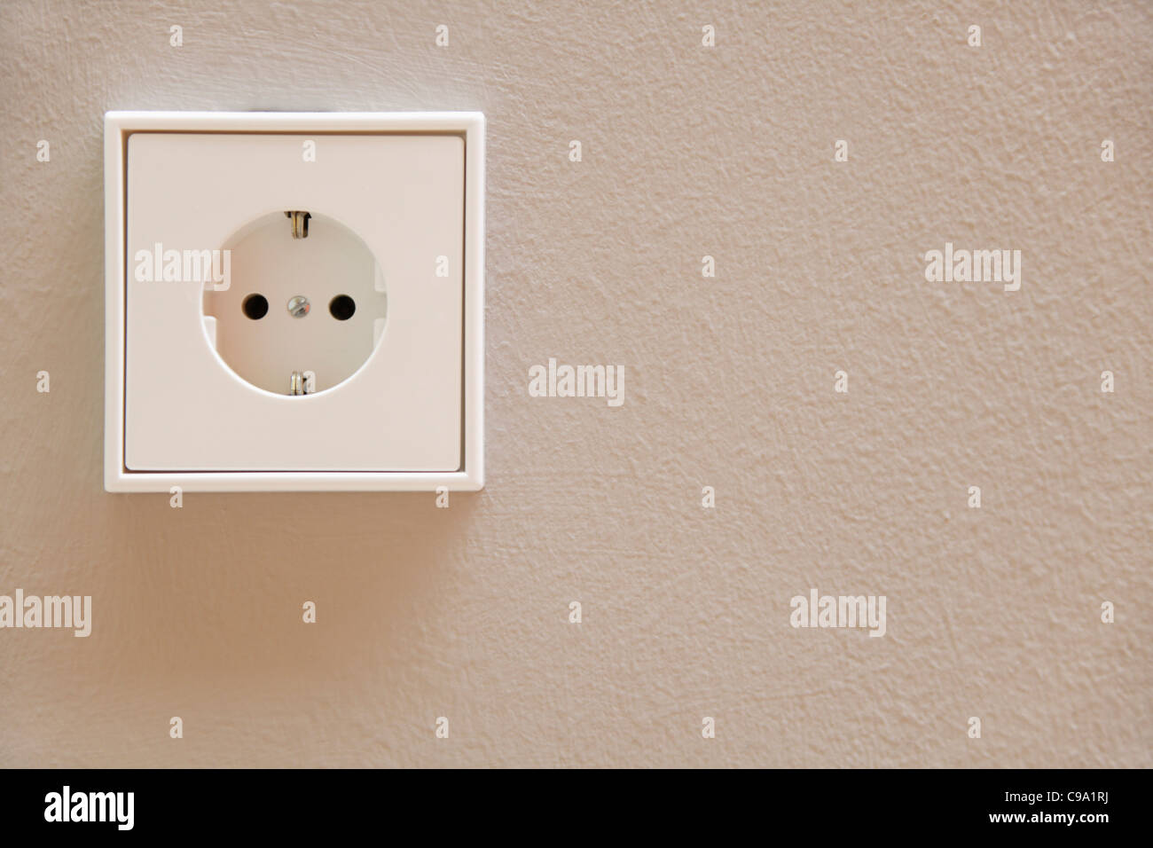 Germany, Upper Bavaria, Munich, Close up of wall socket in new house Stock Photo