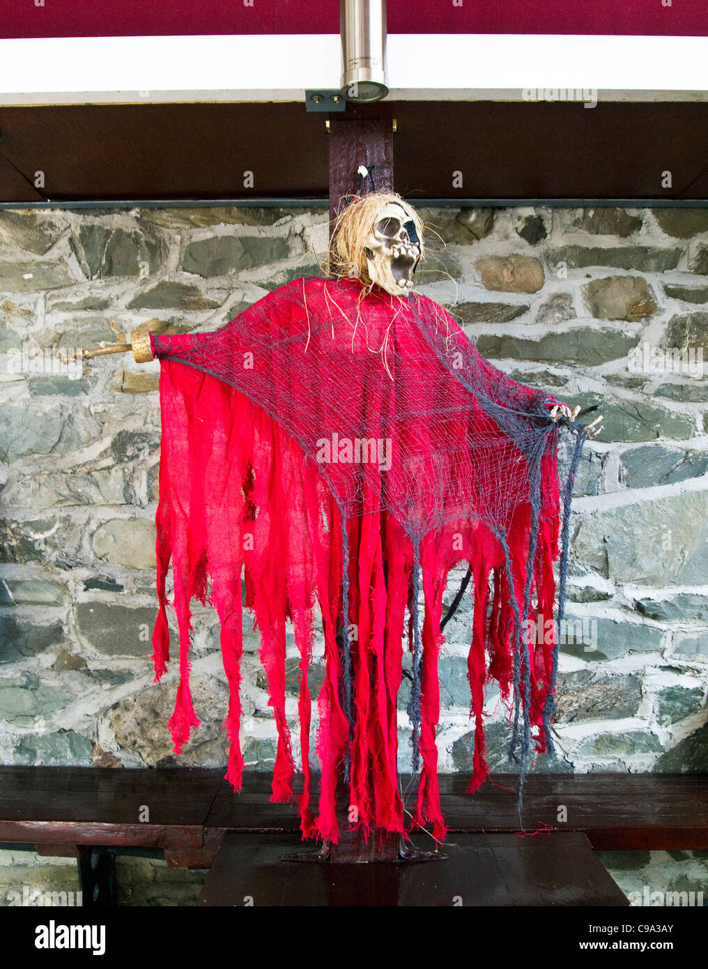 A Halloween grotesque figure in an Irish pub Stock Photo