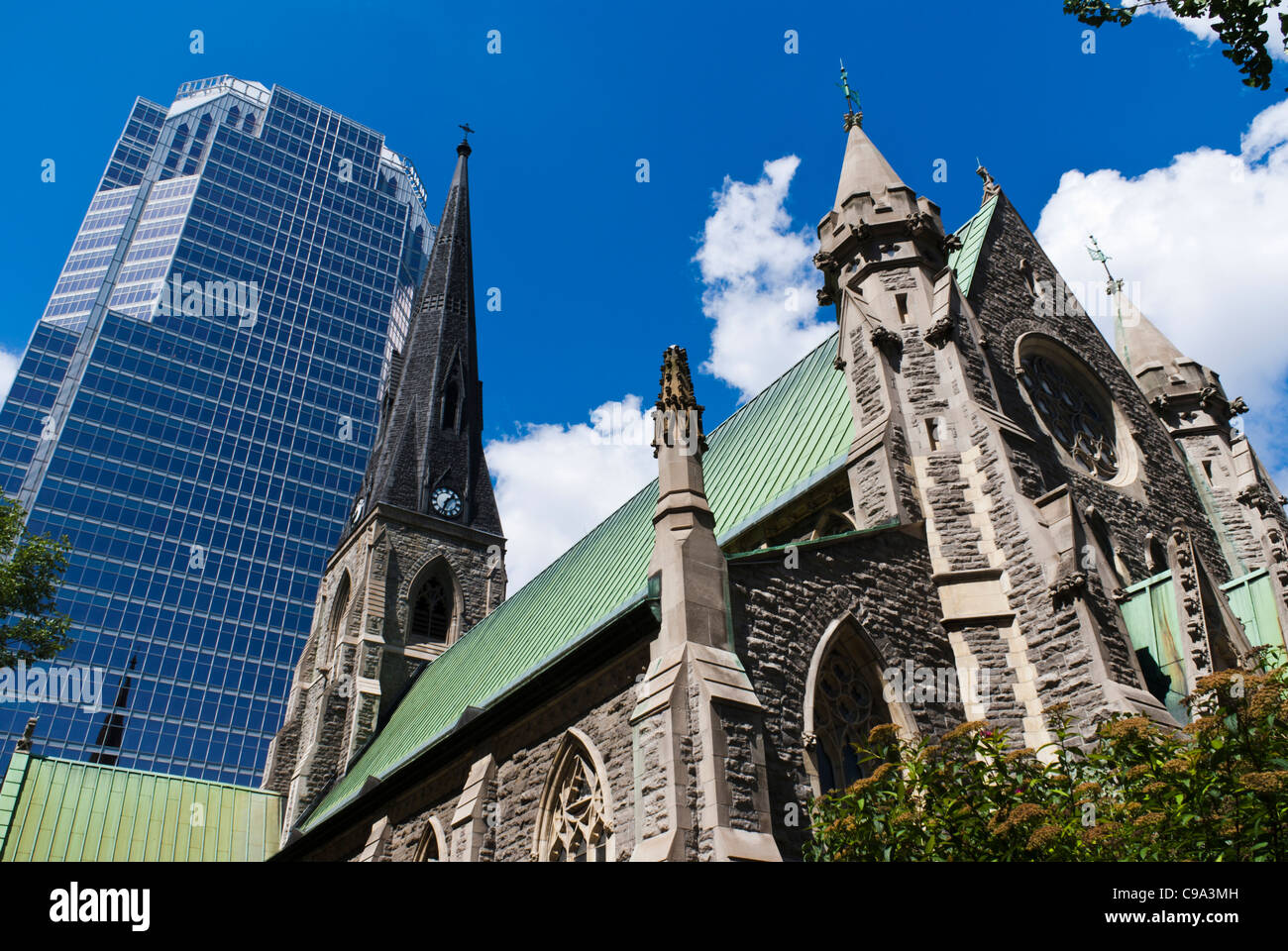 The Christ Church Cathredral and the Tour KPMG in downtown Montreal, Quebec, Canada Stock Photo