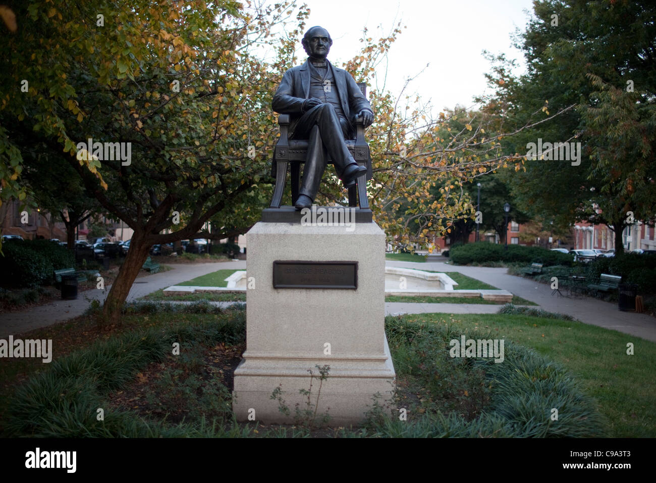 A statue of philanthropist George Peabody stands in a park in the Mount Vernon neighborhood of Baltimore, Maryland. Stock Photo