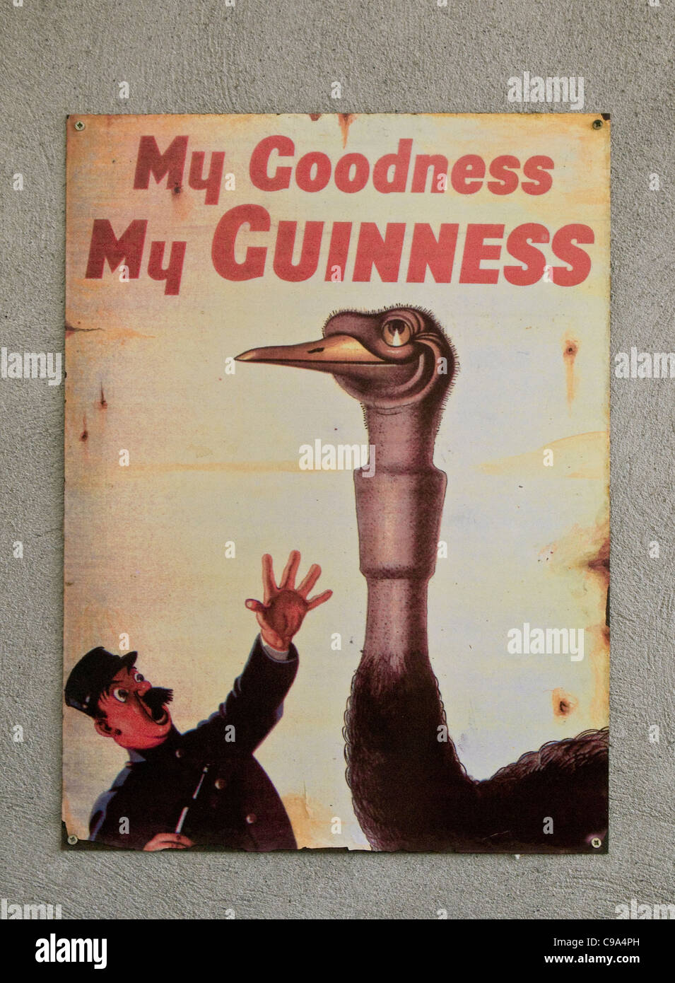 An Old metal sign advertising Guinness beer in a Dublin pub Stock Photo