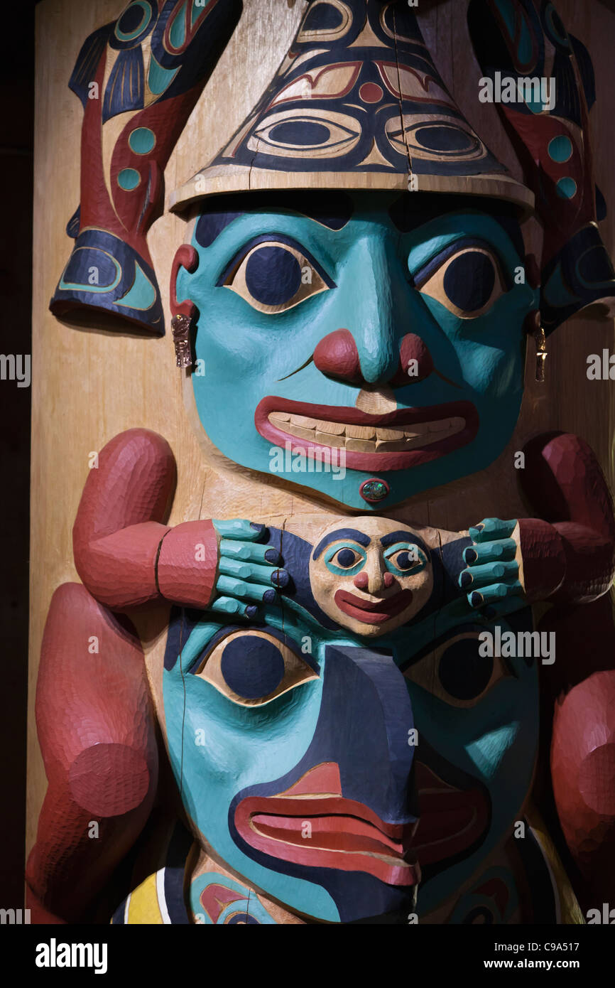 Totem pole in Alaska Native Heritage Center in Anchorage, Alaska Stock