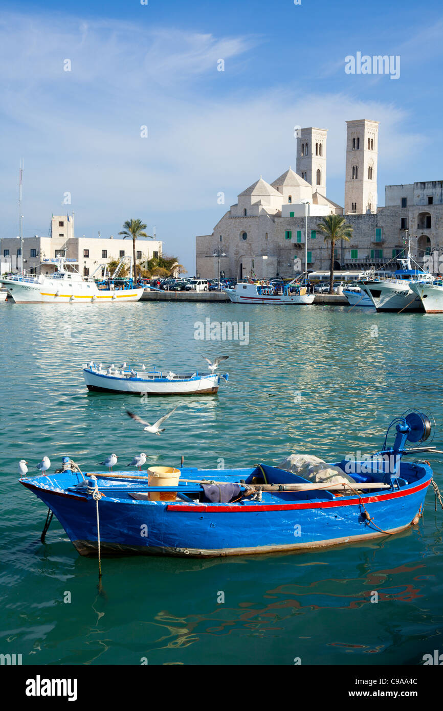 Molfetta Duomo (St. Corrado's Church) with Boats and Seagulls - Apulia, Italy Stock Photo