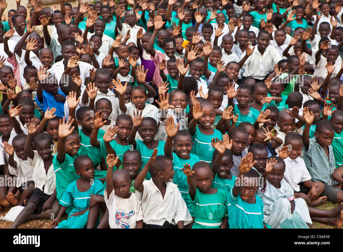 Children at Nyamiyaga primary school where the Bwindi Community Hospital run health outreach programs. Uganda. Stock Photo