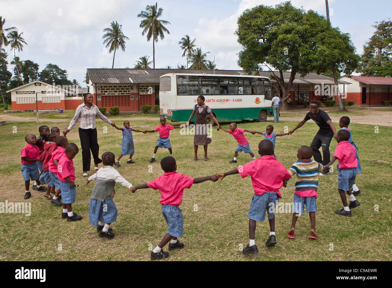 Children doing a PE class at the Wema Centre, Mombassa, Kenya. Wema provide a rehabilitation program for street kids. Stock Photo