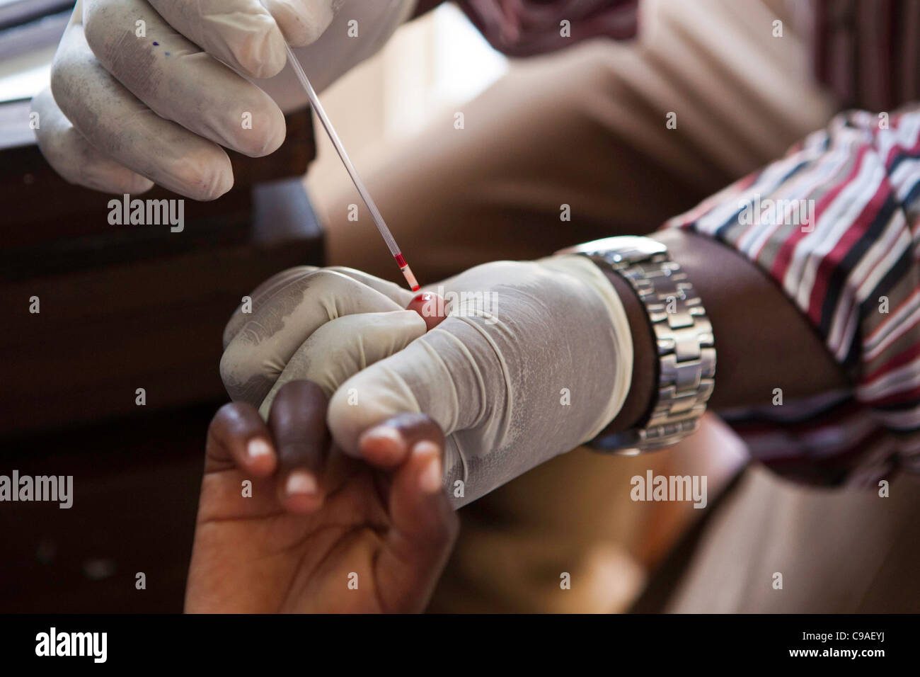 A blood test is being carried out at the Voluntary Testing Clinic at the Wema Centre in Mombasa, Kenya. Stock Photo