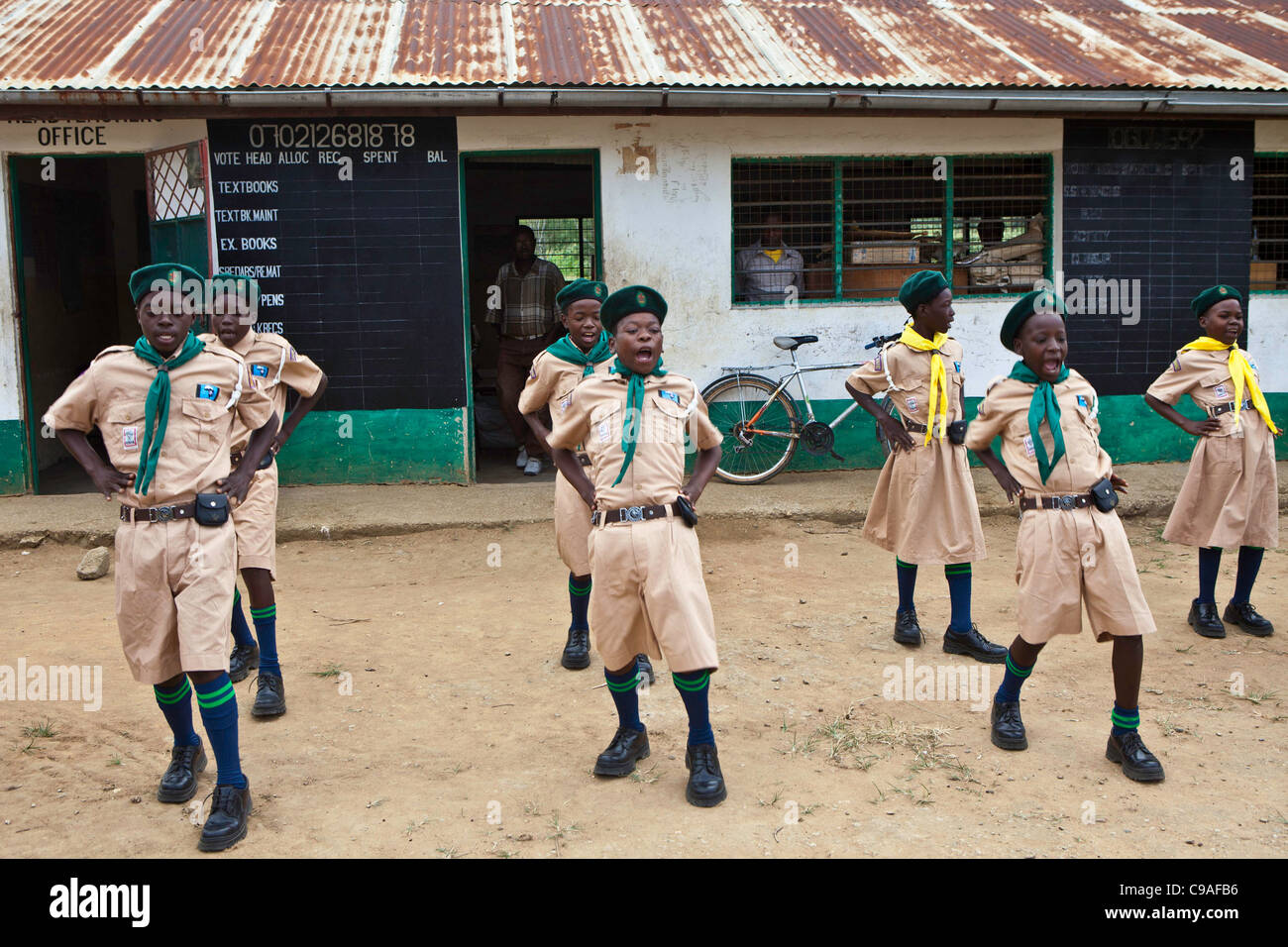 Scouts practice their routine in the grounds of their school. Mombasa, Kenya. Stock Photo