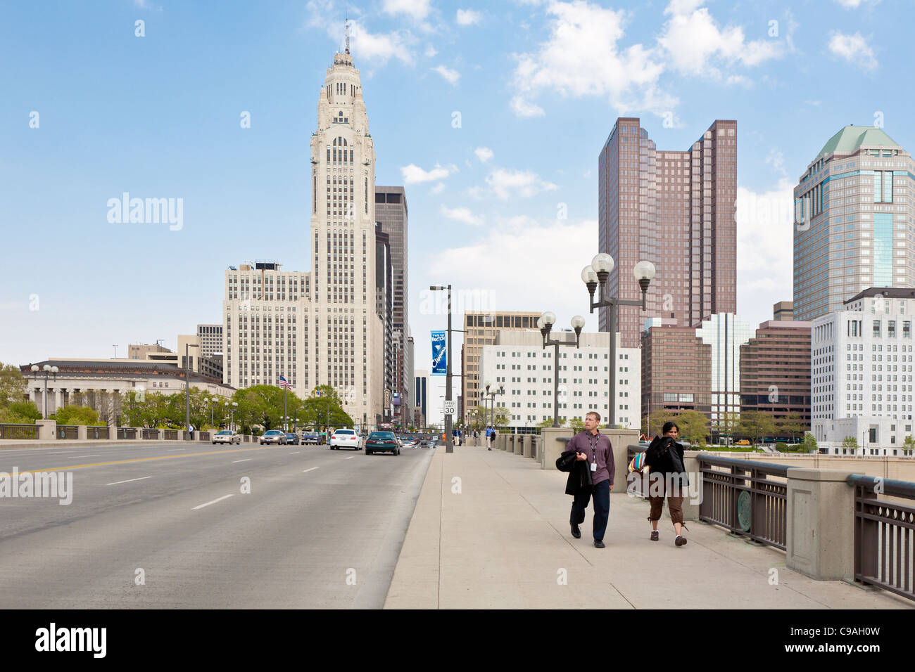 Cityscape of downtown Columbus, Ohio as seen from foot of Broad Street Bridge across the Scioto River. Stock Photo