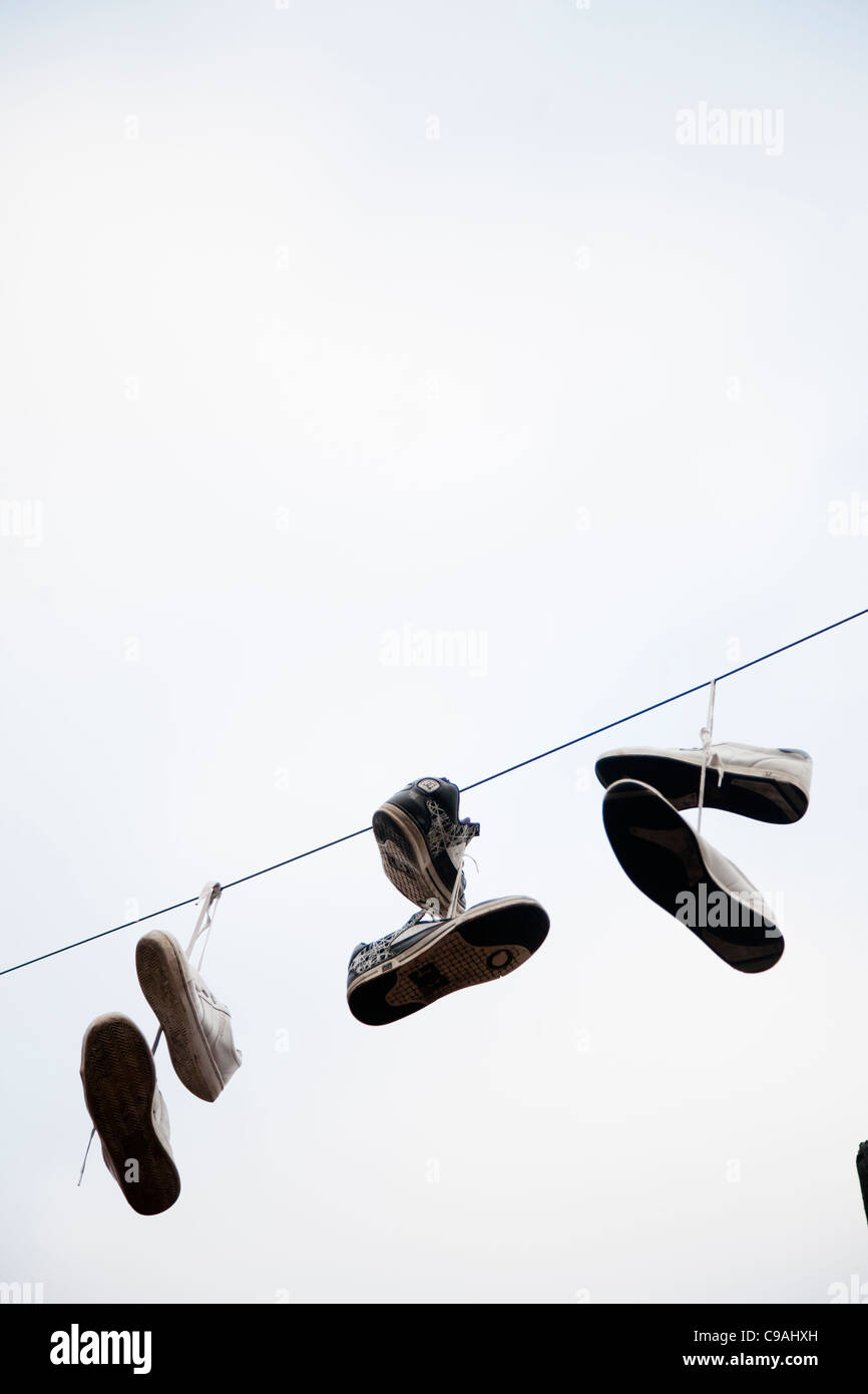 Shoes on a telephone wire, Brighton, UK Stock Photo Alamy