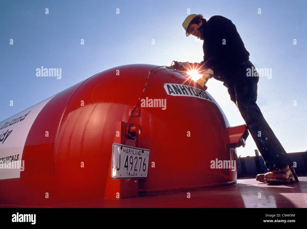 Worker at a distributor of solvents, chemicals and lubricants Stock Photo