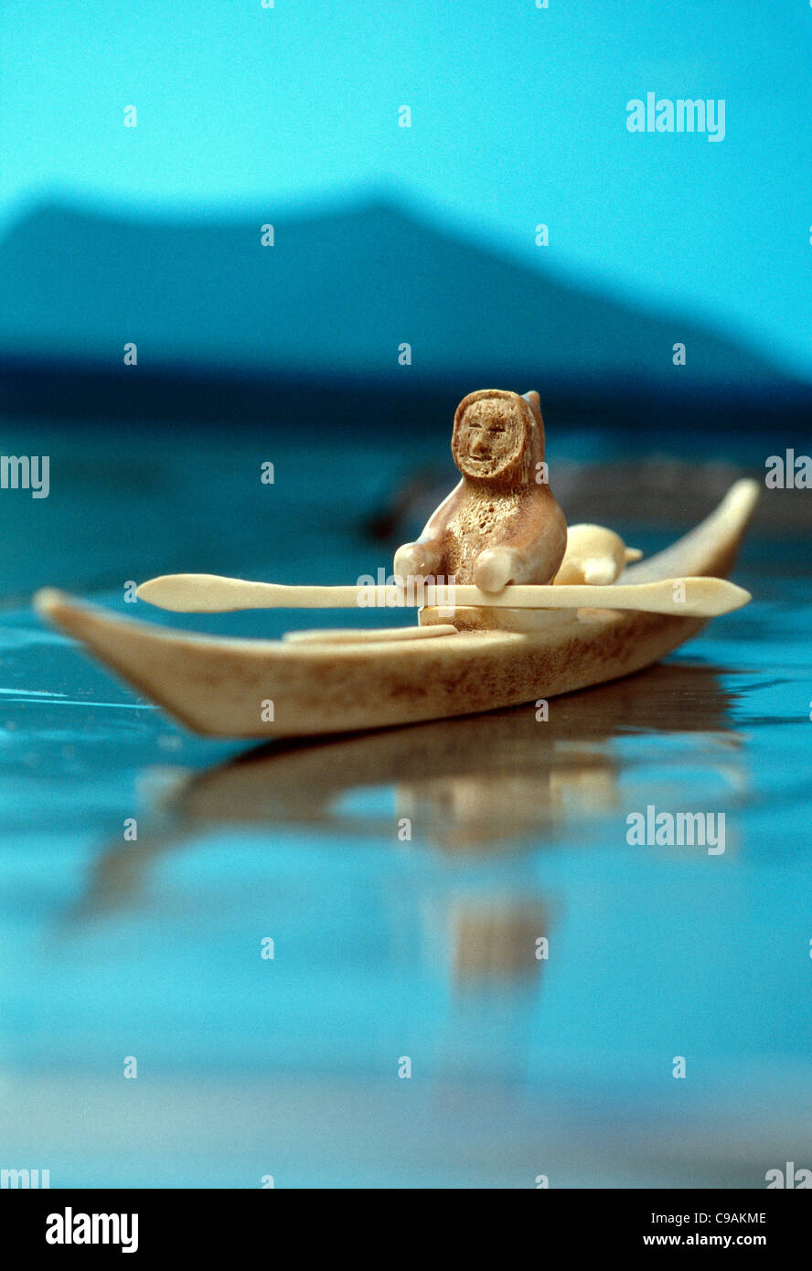 Soapstone And Caribou Antler Carving Of Eskimo In Kayak Stock Photo Alamy