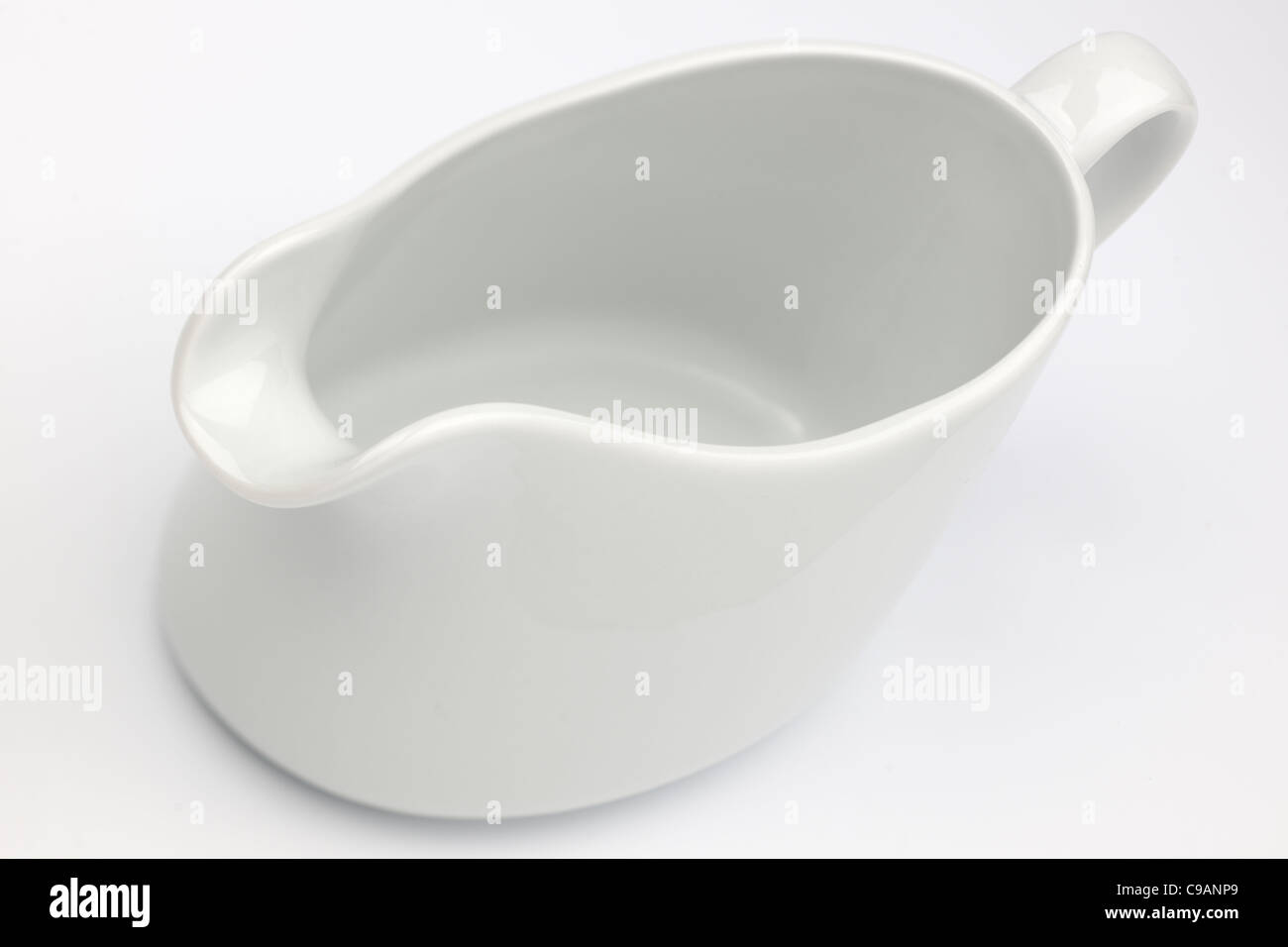 White ceramic gravy dish Stock Photo