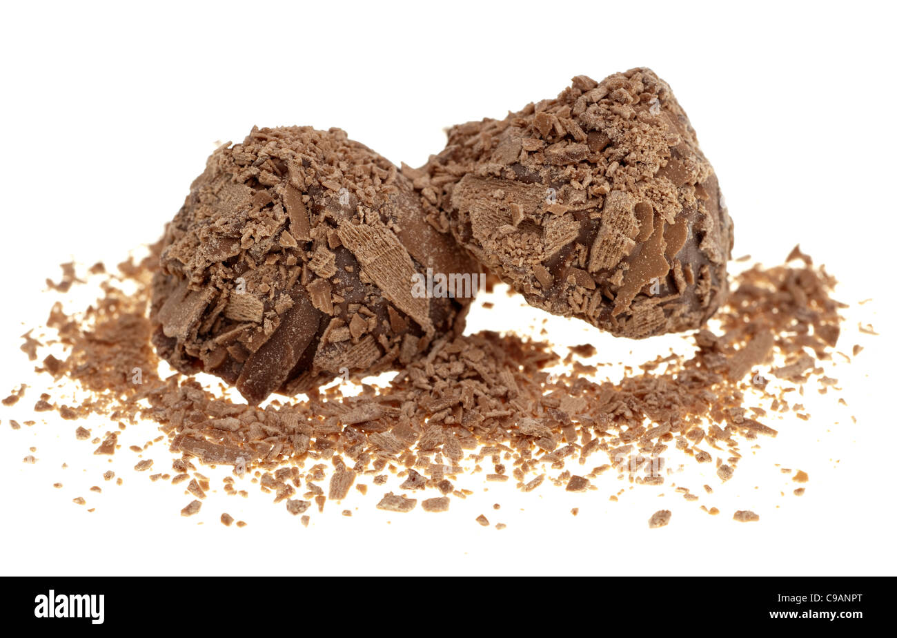Two flaked milk chocolate truffles Stock Photo