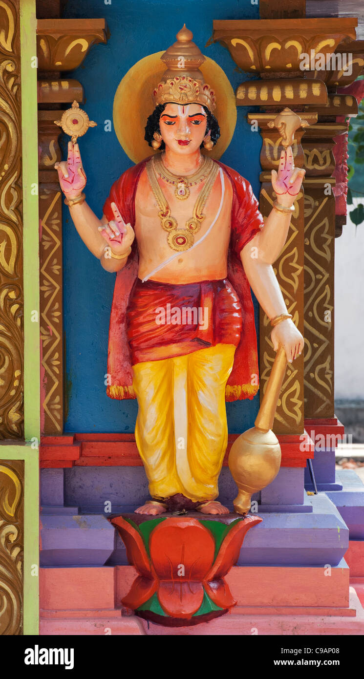 Vishnu statue on a colourful Hindu Hanuman temple. Andhra Pradesh, India Stock Photo