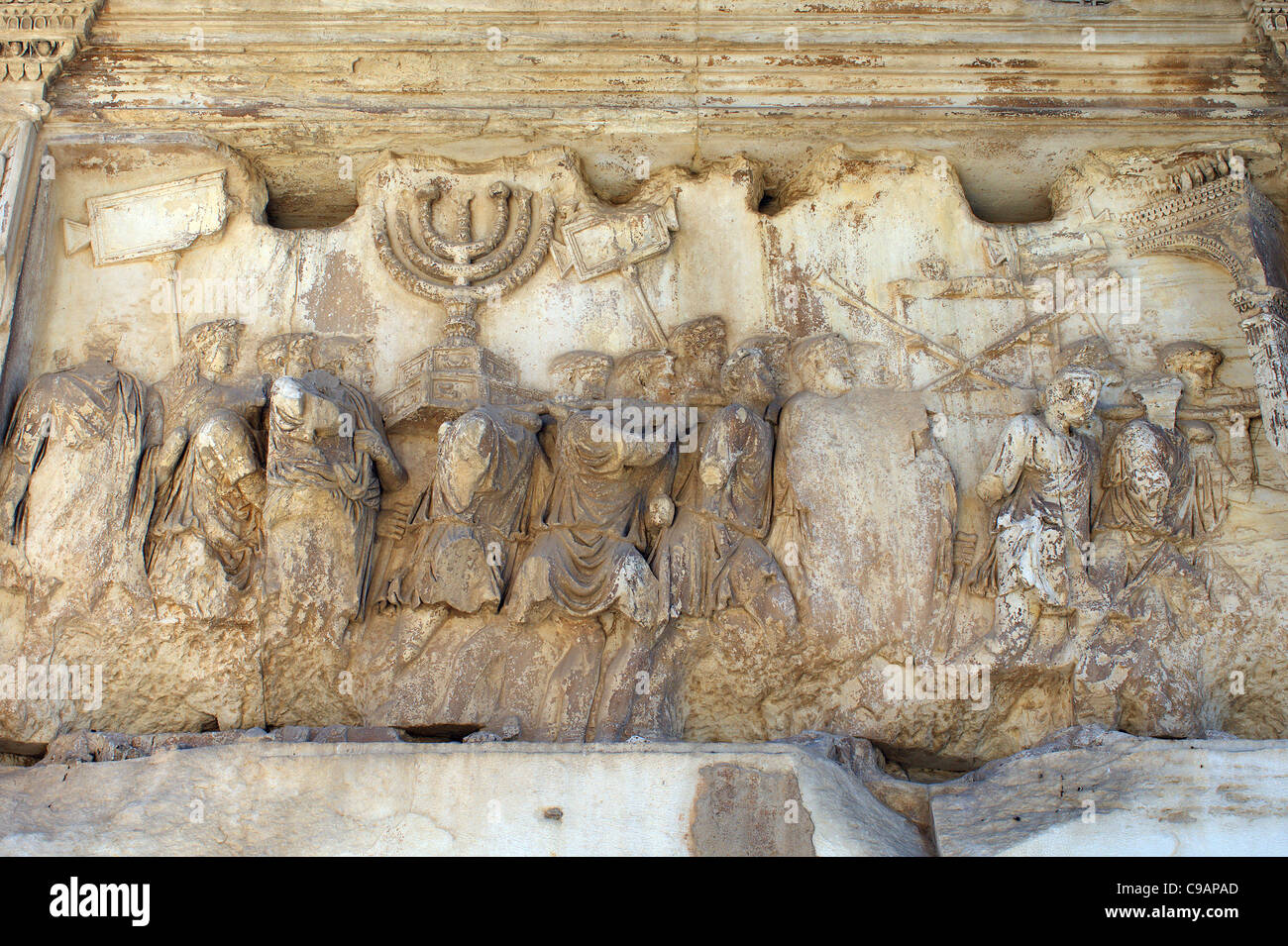 Relief from the Arch of Titus Rome Roman soldiers carrying the golden menorah and other spoils from the Temple of Jerusalem Stock Photo