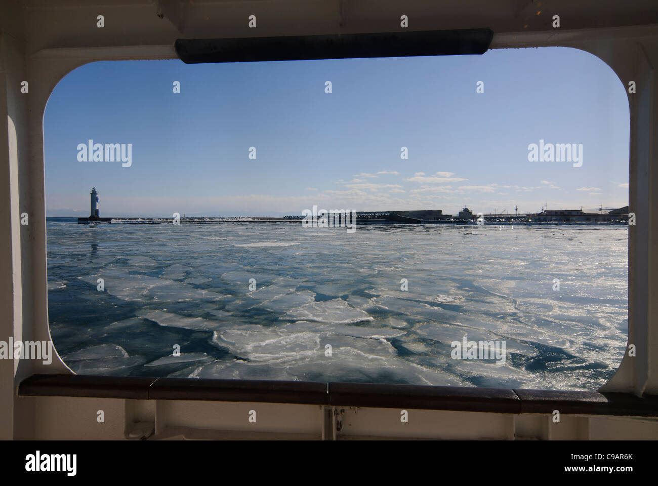 View of frozen sea, through ship's window, Shiretoko and Nemuro, Hokkaido, Japan Stock Photo