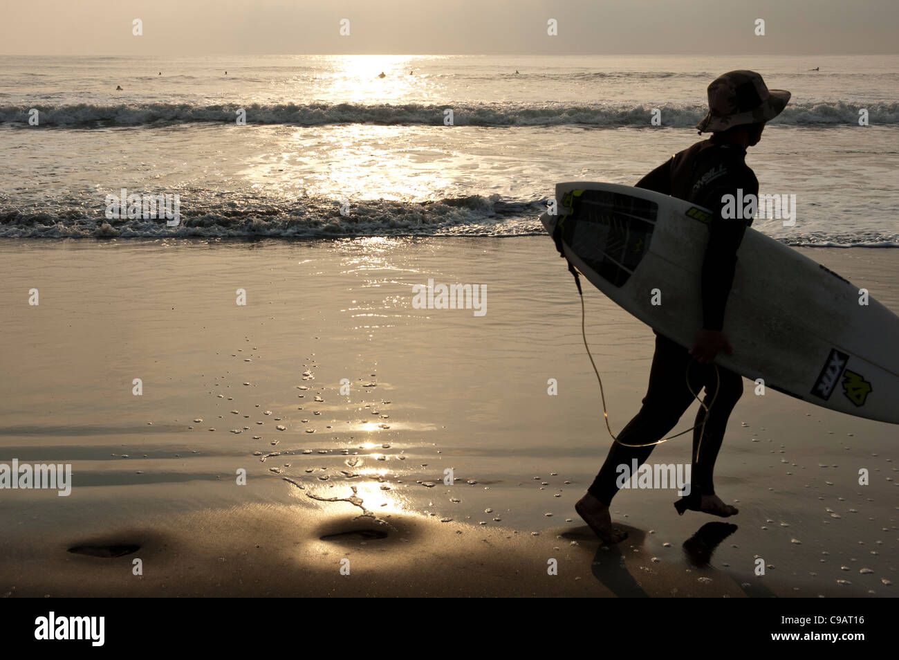 sunrise surfer surfboard Japan beach surfing Stock Photo
