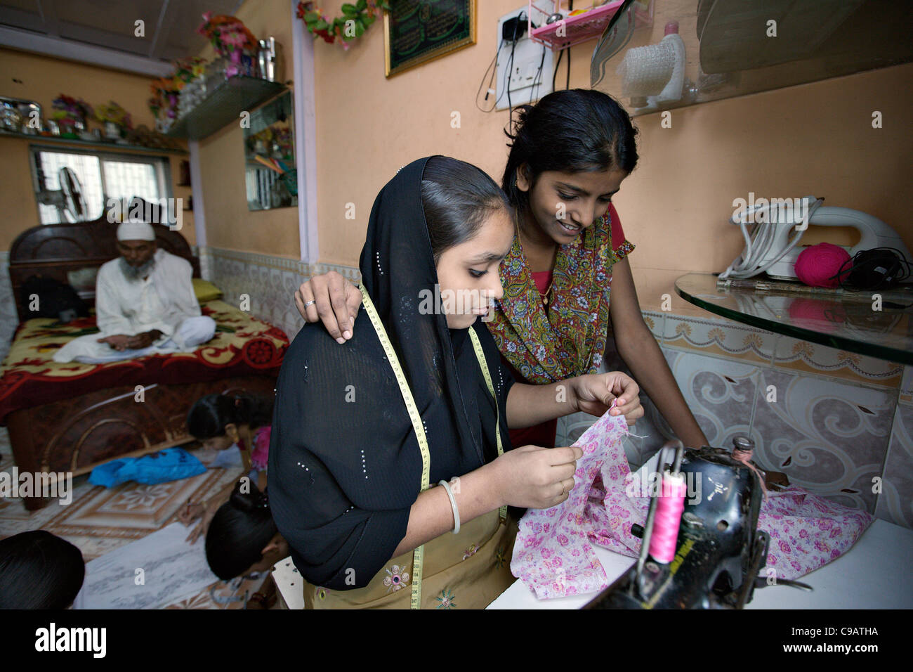 Sewing course in Subash Nagar slum area in Mumbai, India. Stock Photo