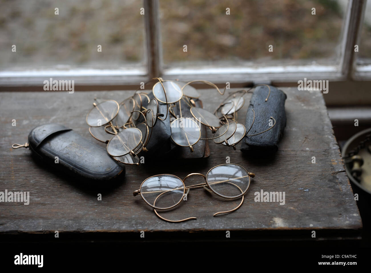 The Shambles Victorian Village in Newent, Gloucestershire - a museum of Victoriana - Optician's glasses Stock Photo