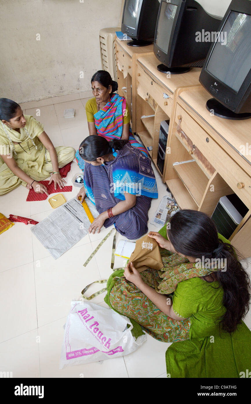 Sewing course in Subash Nagar slum area in Mumbai, India. Stock Photo