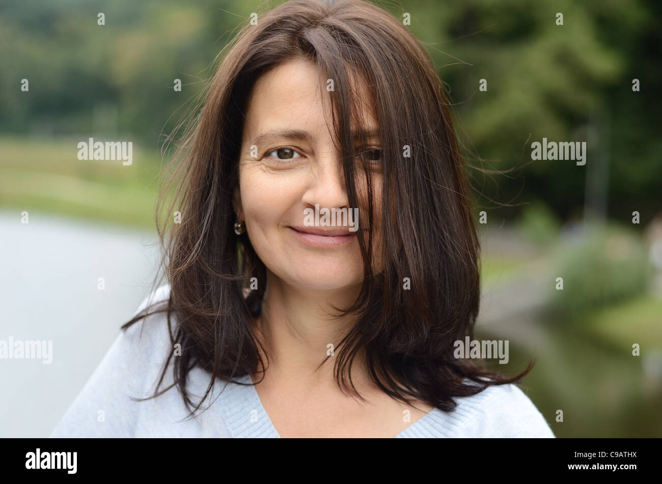 Woman happy park forty hi-res stock photography and images - Alamy