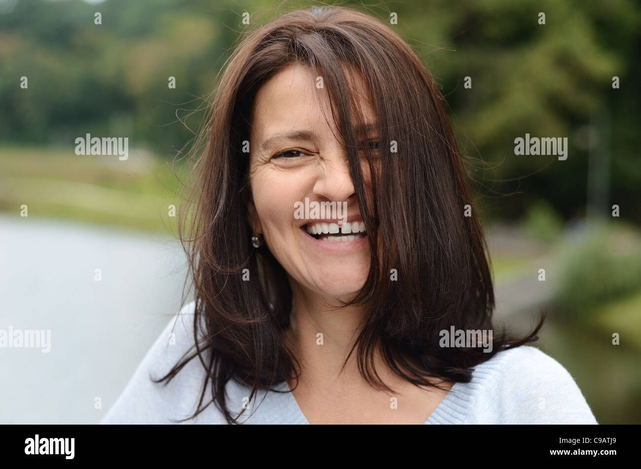Woman happy park forty hi-res stock photography and images - Alamy