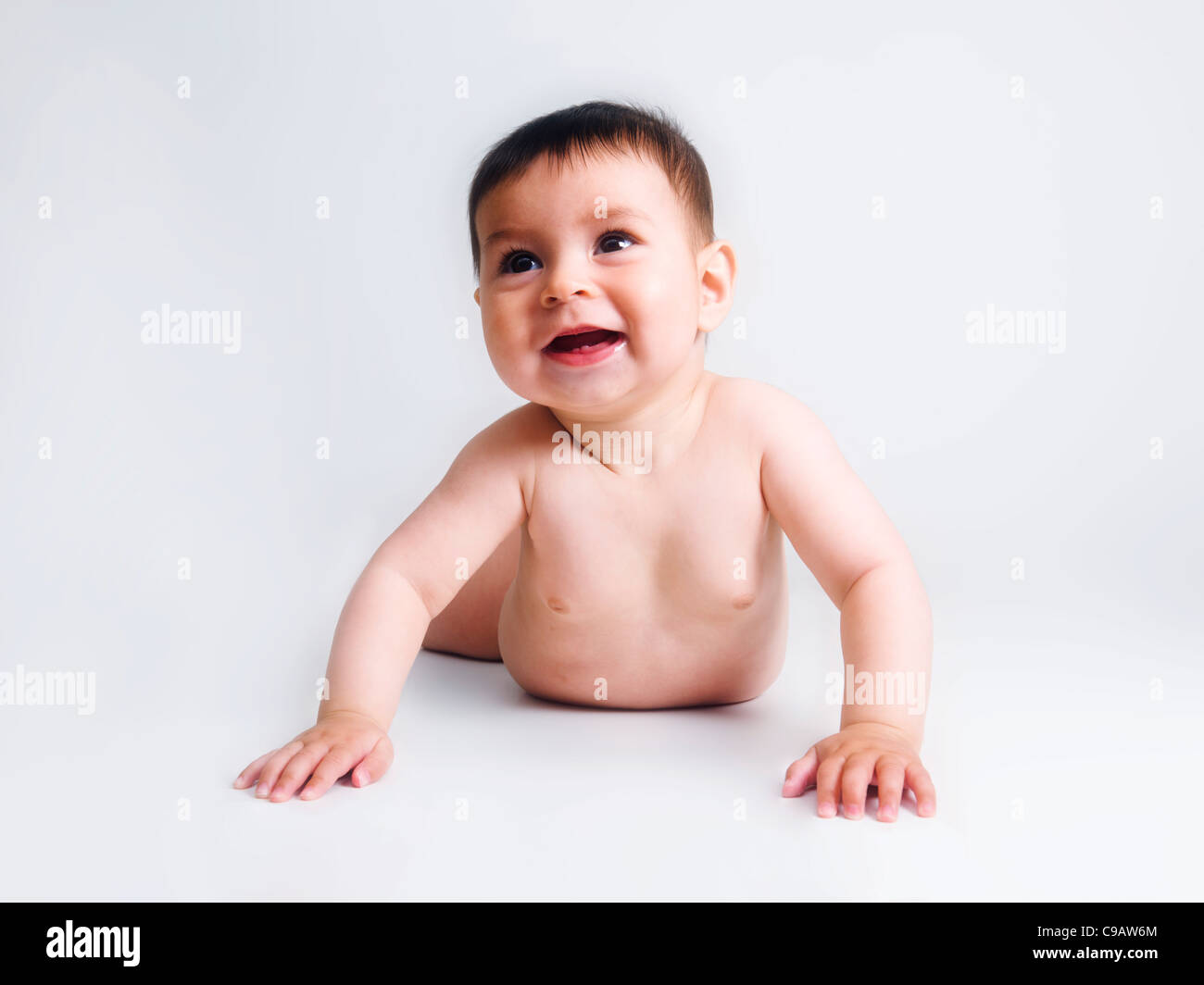 5 month baby boy on stomach lifting chest happy smiling Stock Photo Alamy
