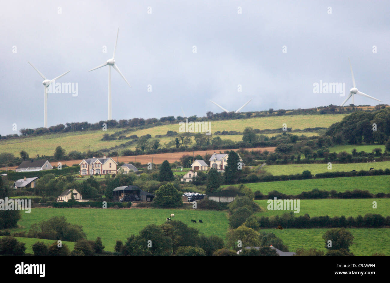 Wind Turbines over Farms, Kilkenny, Ireland. Stock Photo