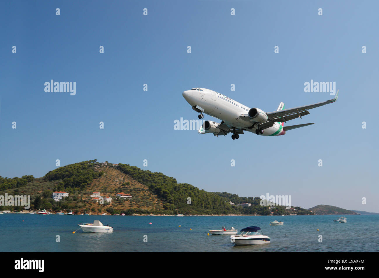 Aeroplane landing at Skiathos Town, Skiathos, Greece Stock Photo