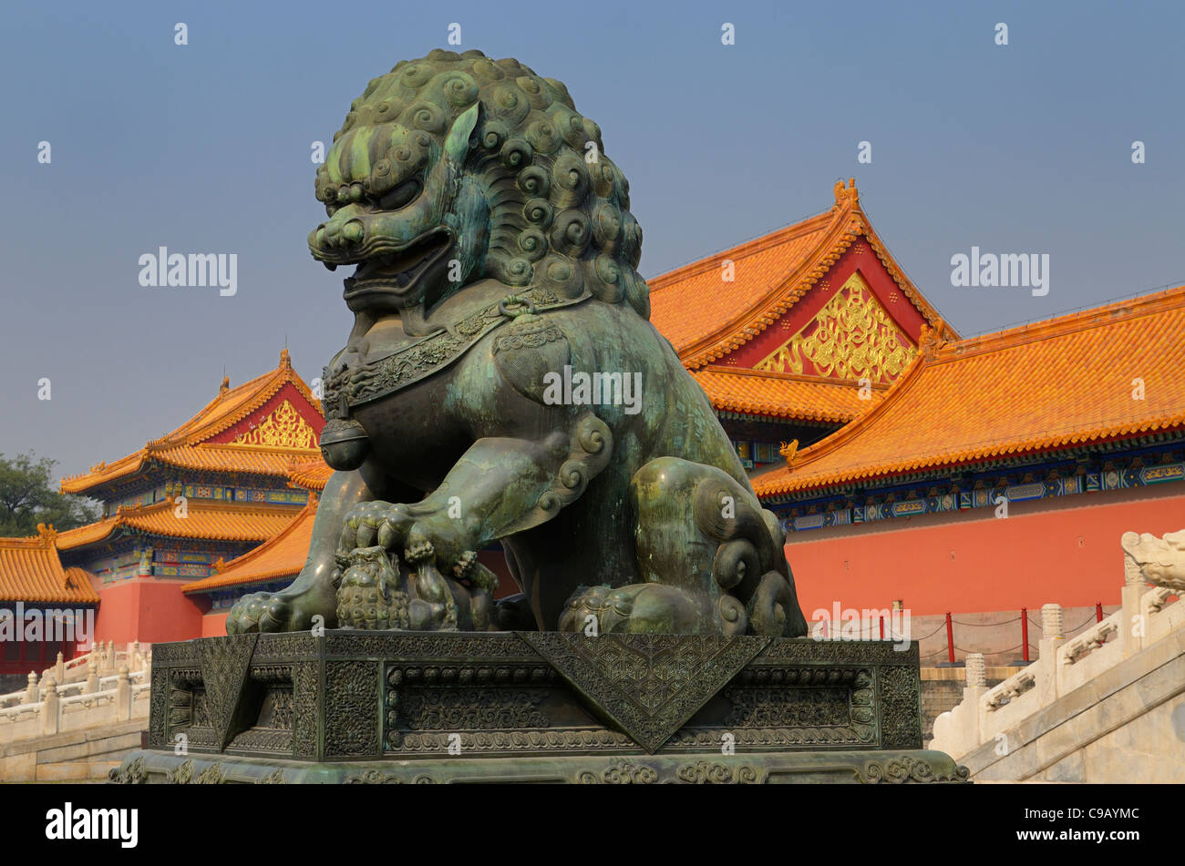 Bronze female lioness with baby at the Gate of Supreme Harmony in the Forbidden City Beijing Peoples Republic of China Stock Photo
