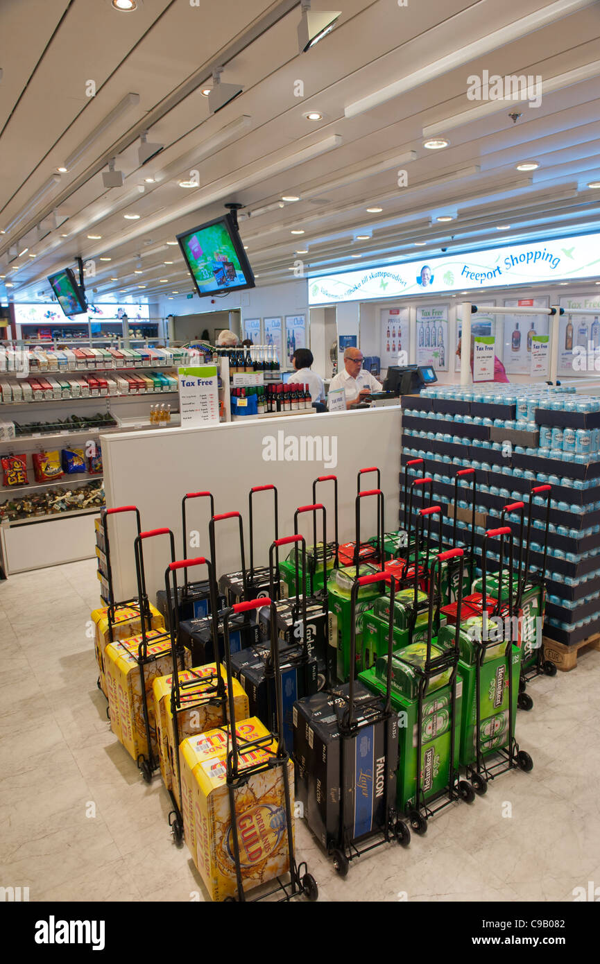 Beer trolleys inside the Tax free ferry shop on board the Cruise ship Birka Paradise that sails between Sweden and Finland. Stock Photo