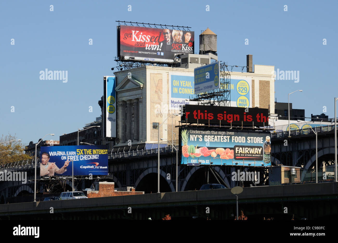 Advertising hoardings above the Henry Hudson Parkway New York USA Stock Photo