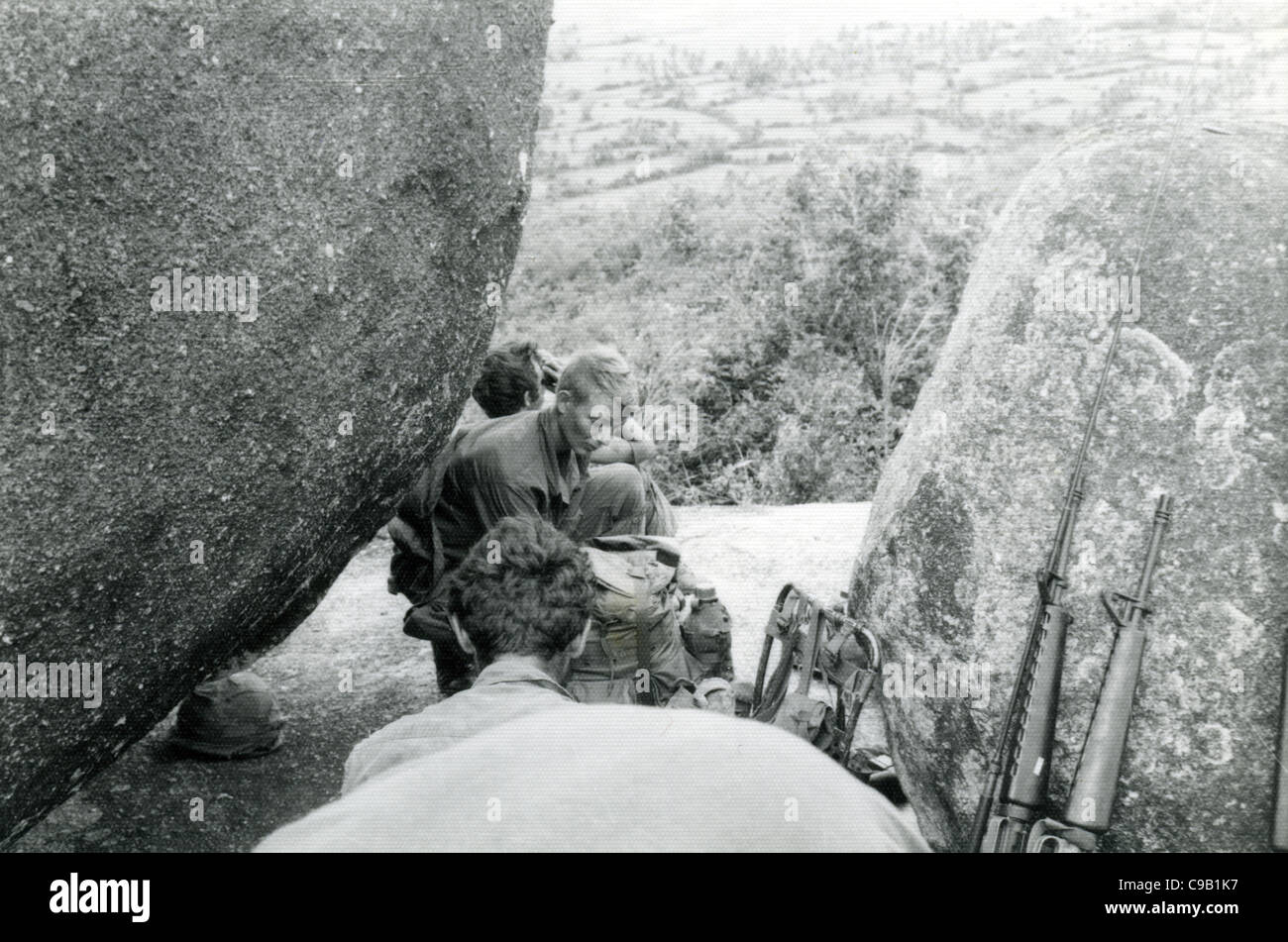 US soldiers on high area next to rocks m16s m16 rifle. 101st ABN in the Ashau Valley during the Vietnam War. Stock Photo