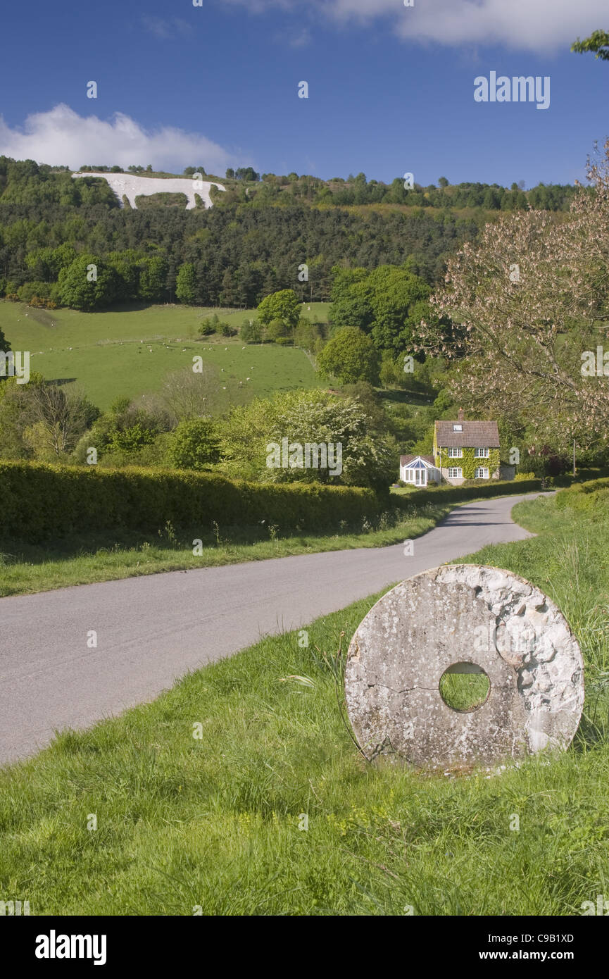 Boundary stone marking entrance to North York Moors National Park & Kilburn white horse carved  on hillside beyond - North Yorkshire, England, UK. Stock Photo