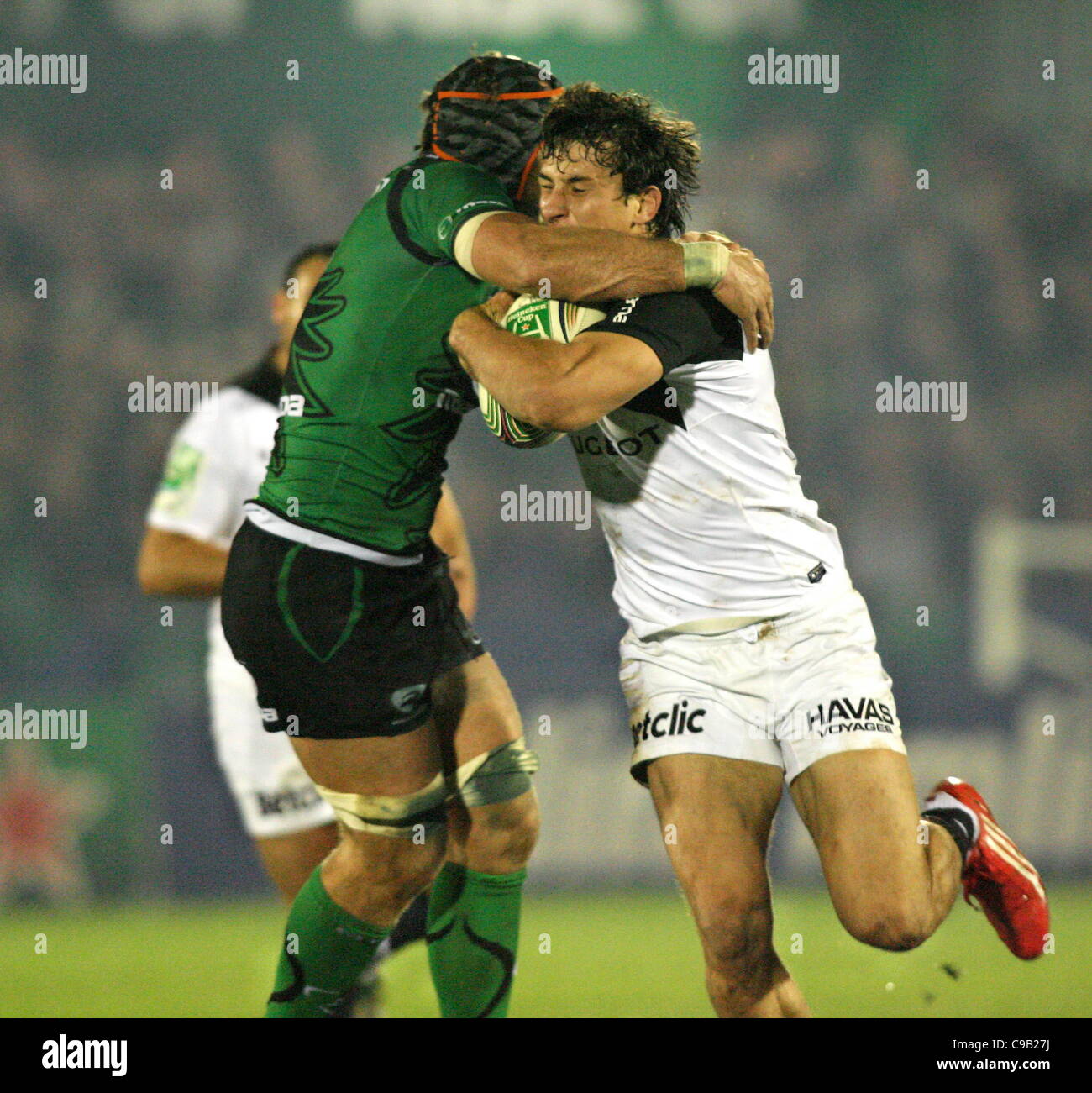 19.11.2011. Galway, Ireland. .  Connacht's John Muldoon in action against Toulouse Yannick Jauzion .  Heineken cup Rugby union, Connacht v Toulouse, Sportsground, Galway, Ireland. Stock Photo