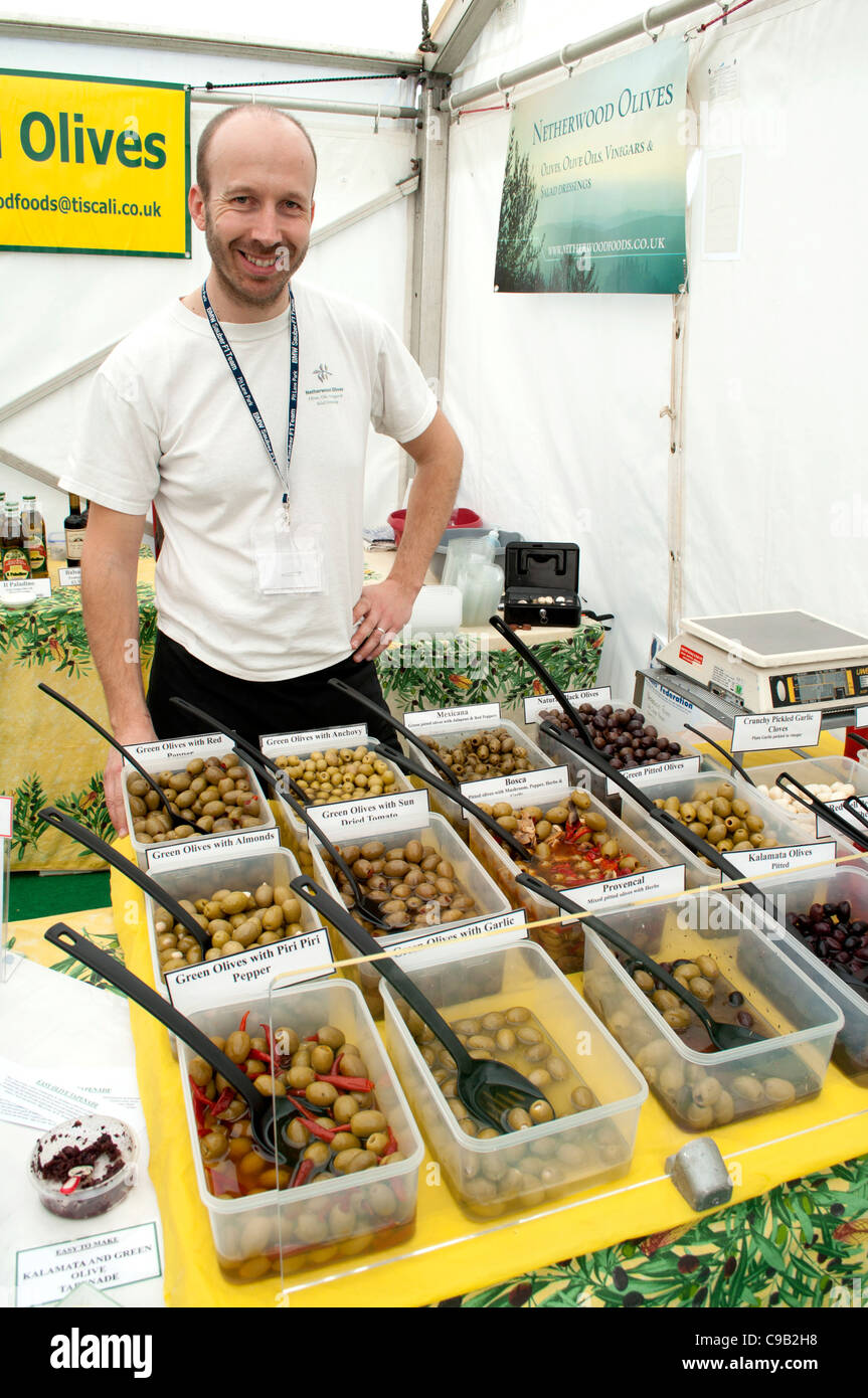 Olive salesman at the Exeter Food Festival in 2009 Stock Photo