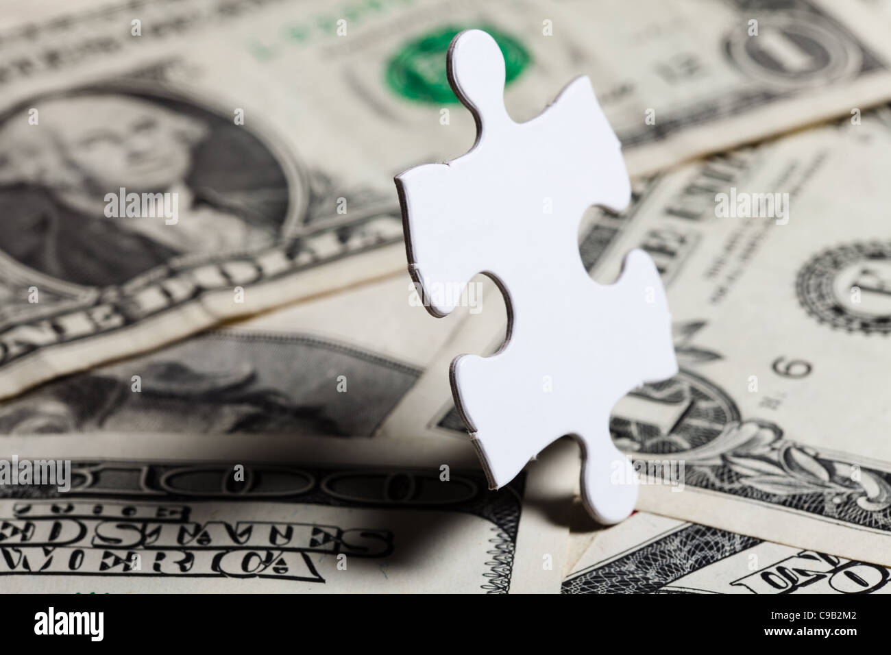 Dollar Puzzle, business concept of Solution Stock Photo Alamy