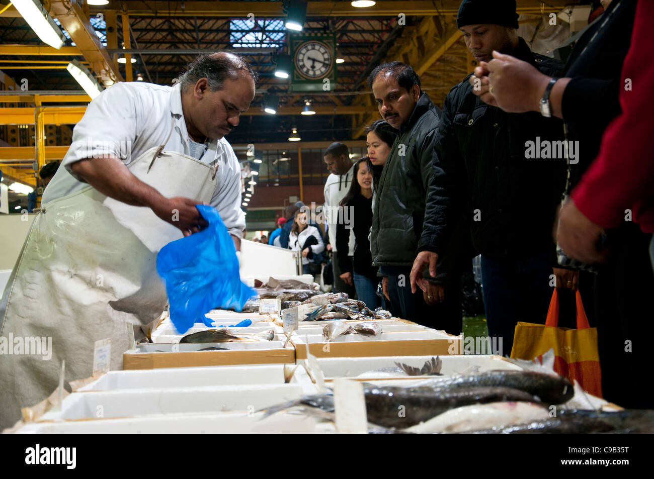 Billingsgate Fish Market in London. Workers sell their fresh fish to