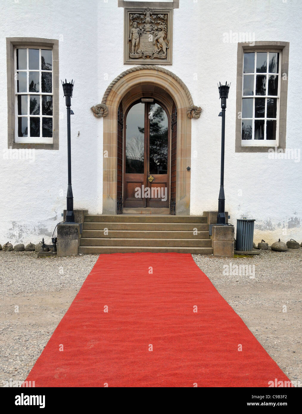 A red carpet laid out at the front entrance of Blair castle, Pitlochry, Perth. Stock Photo