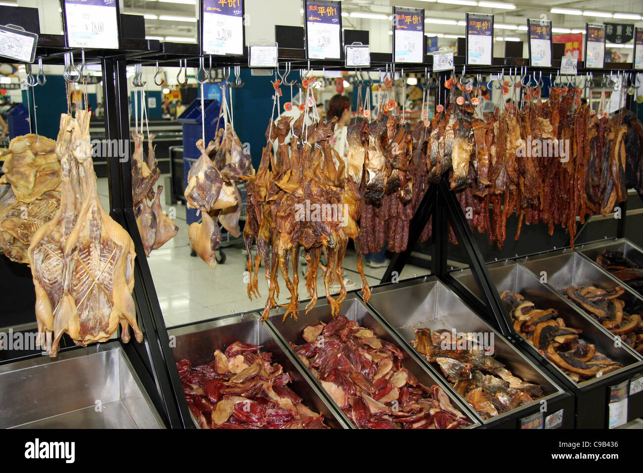 Poultry and meats on the food floor at the Walmart Supercenter in Wuhan