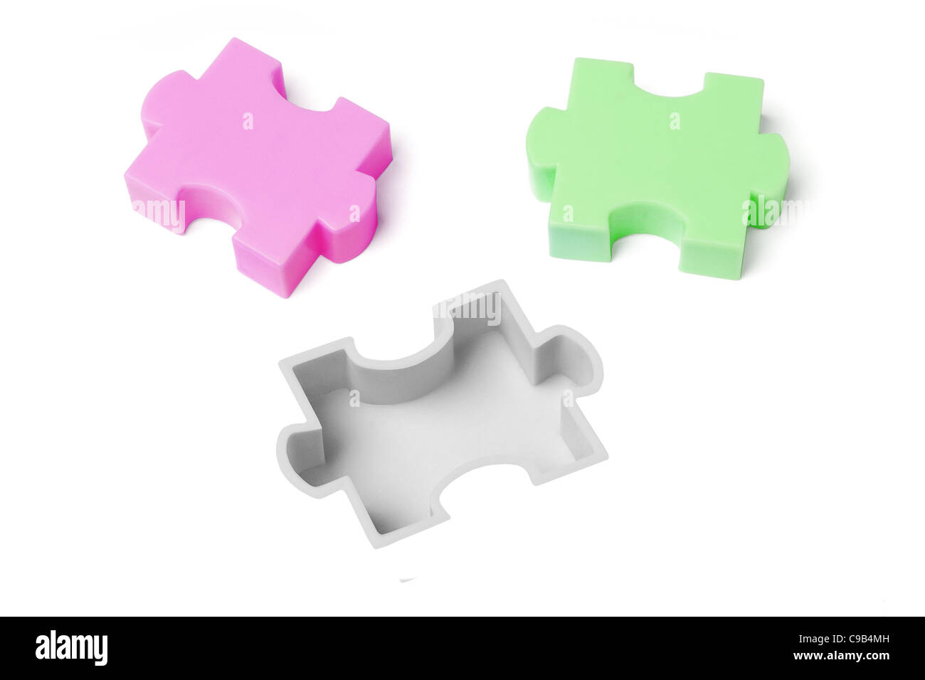 Plastic jigsaw puzzles on white background Stock Photo