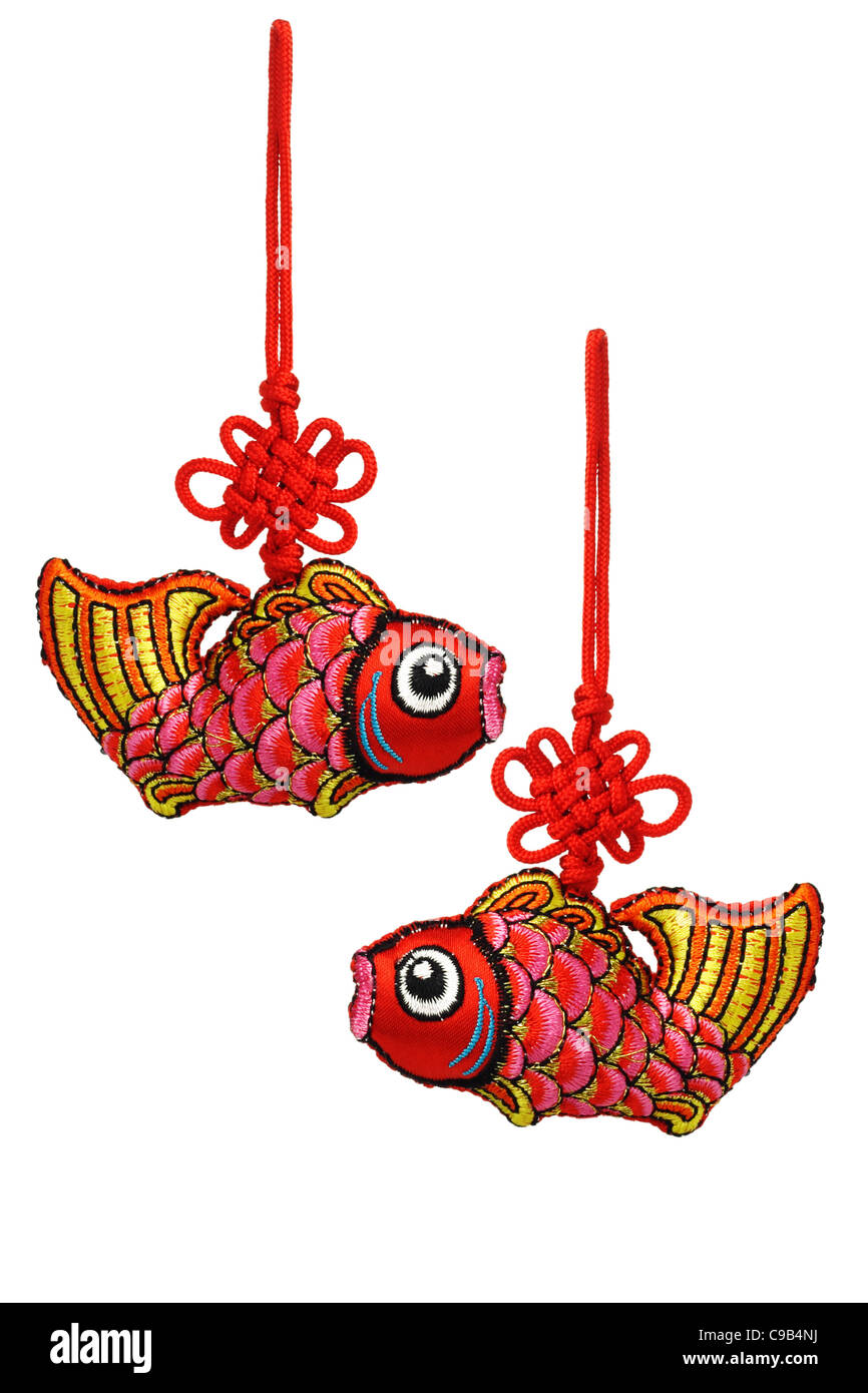 Chinese New Year prosperity fish ornaments on white background Stock Photo