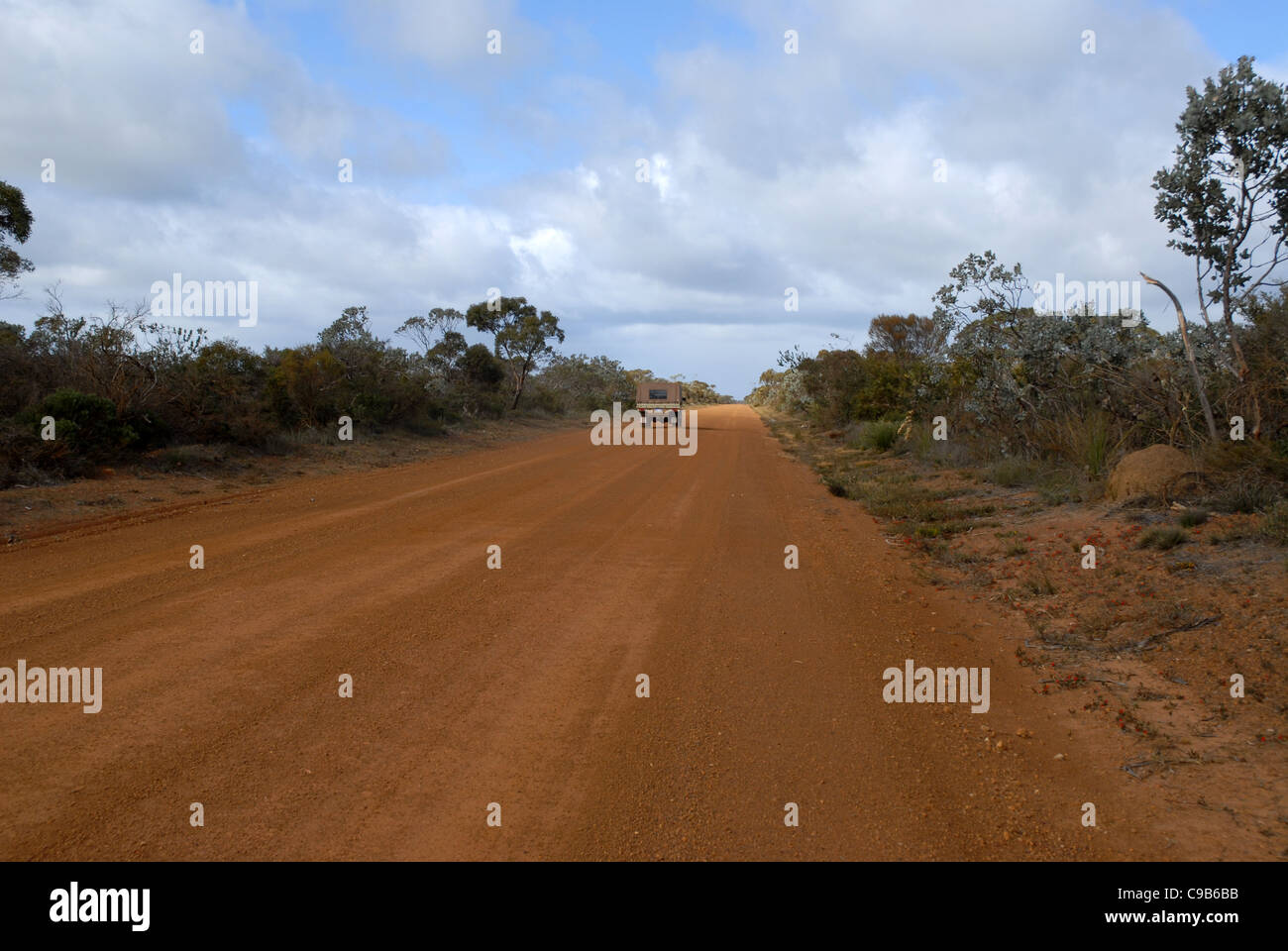 ute on a red dirt road, off South Coast Highway, Western Australia, Australia Stock Photo
